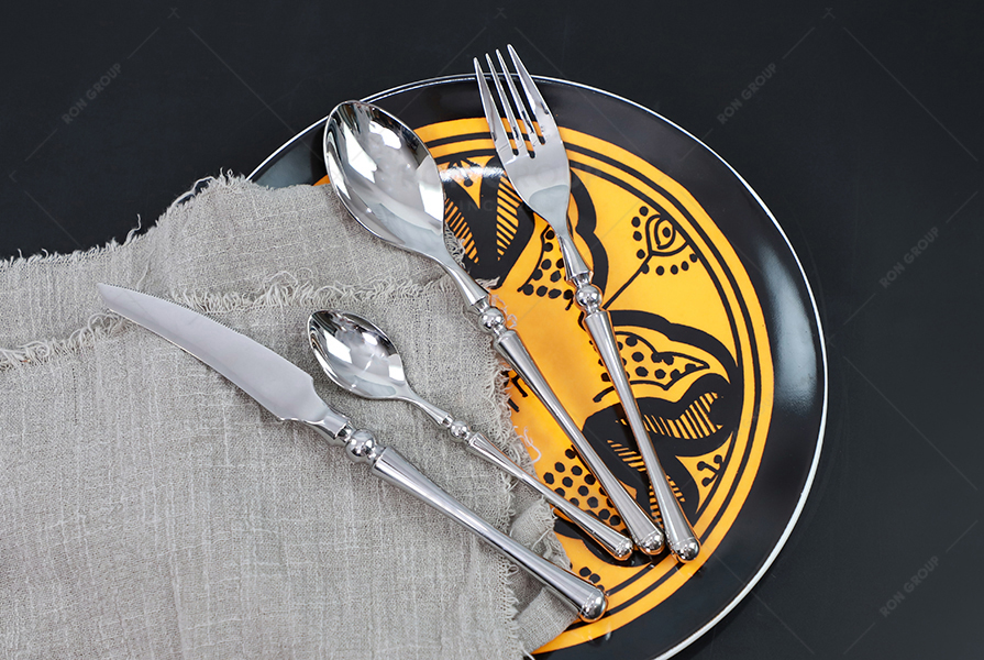 The owners of fine French restaurants love this kind of scene with many types of knives and forks to choose from!